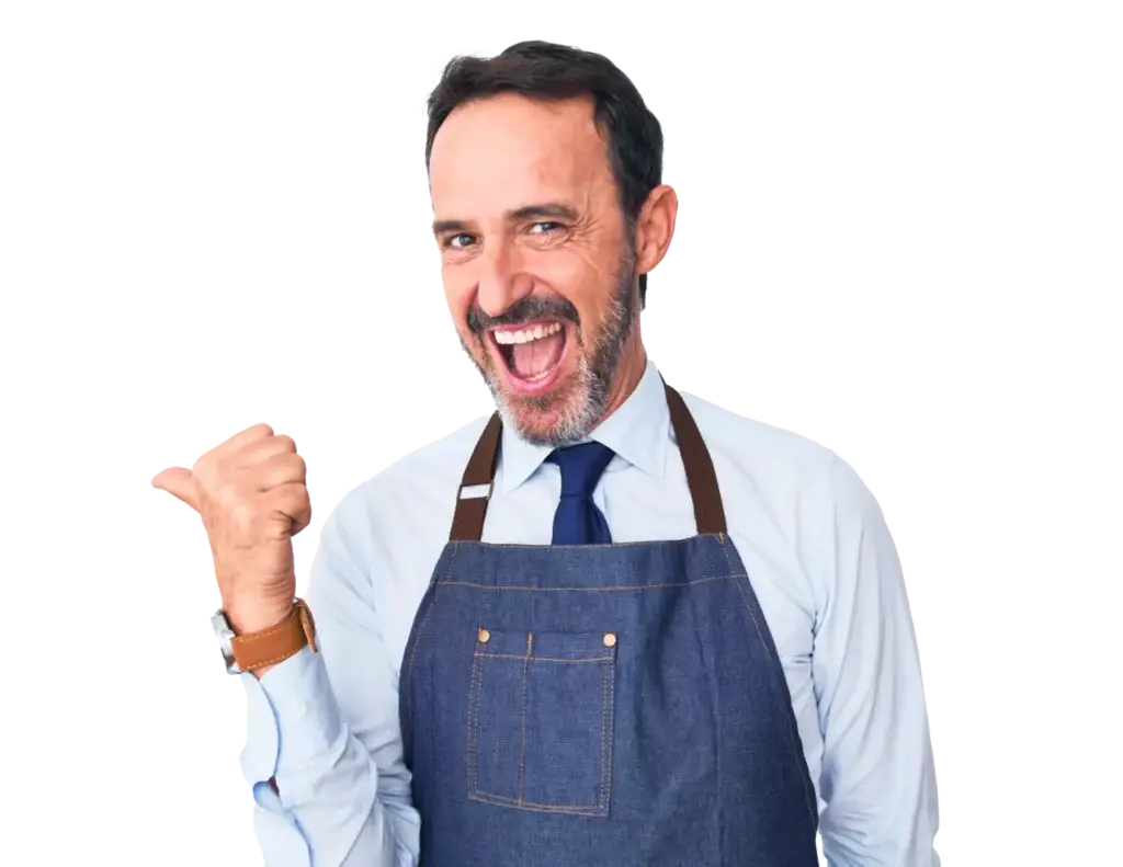 Lächelnder Koch trägt eine Schürze und zeigt mit der Hand Daumen hoch, was Begeisterung und Freude signalisiert. Ideal für Beiträge über Kochen, Gastronomie oder kulinarische Events.